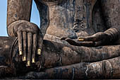 Thailand, Old Sukhothai - Wat Mahathat, detail of the Buddha statue of the bot. 